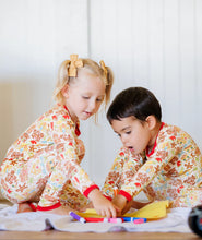 Designed on Maui - Holiday Santa's Surf Shack Long Sleeve Kids Two-Piece Pajama Set